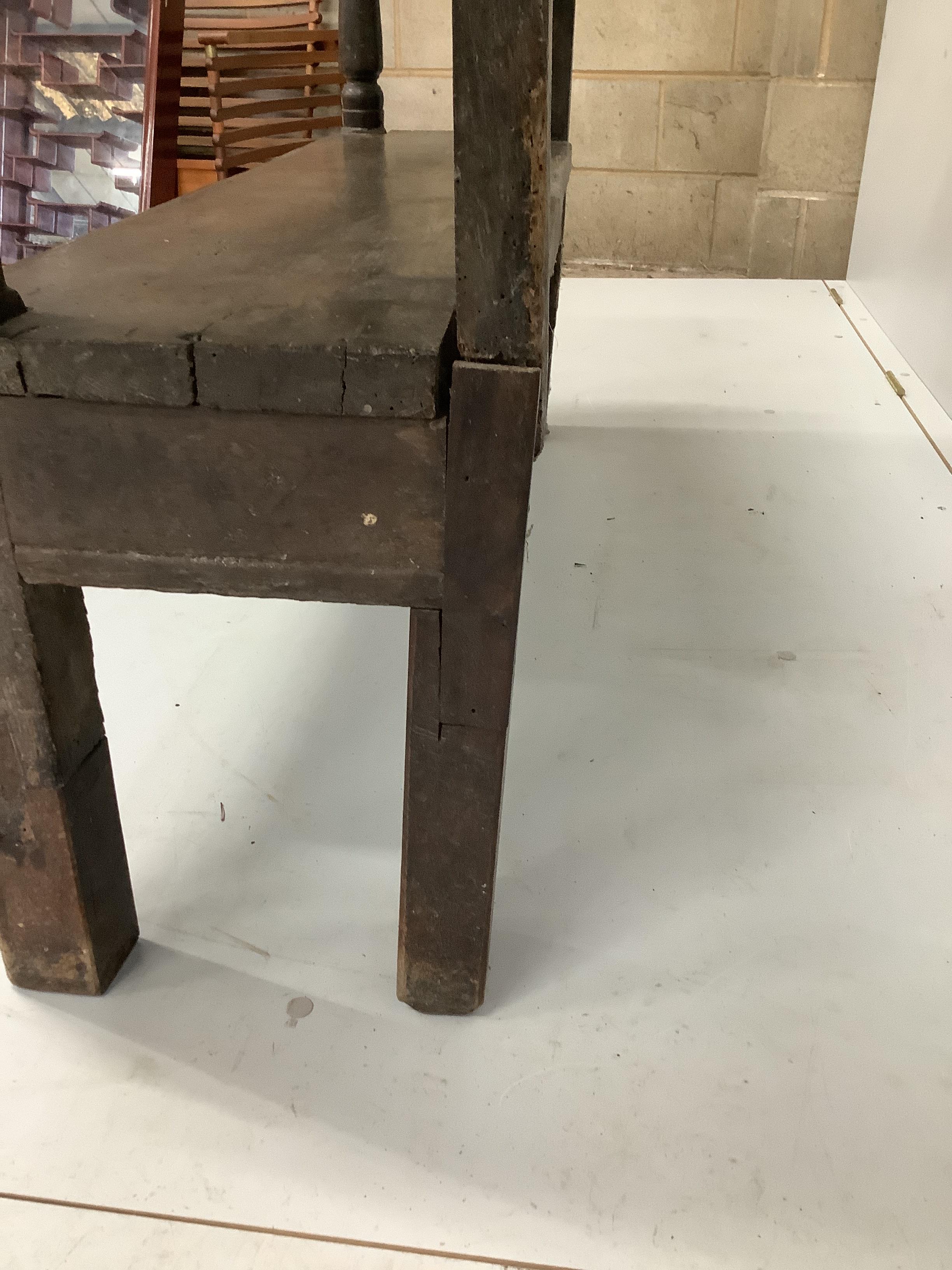 An 18th century oak two tier buffet (likely lacking higher tier), width 119cm, depth 31cm, height 84cm